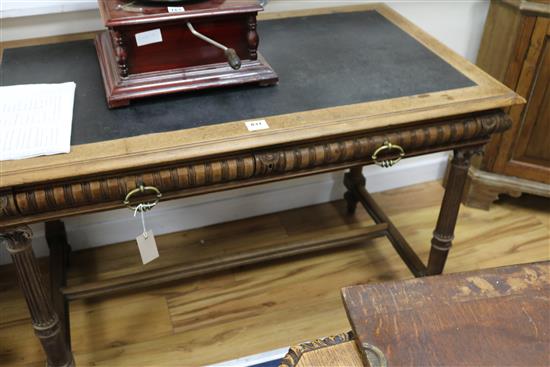 A French walnut writing table, W.120cm